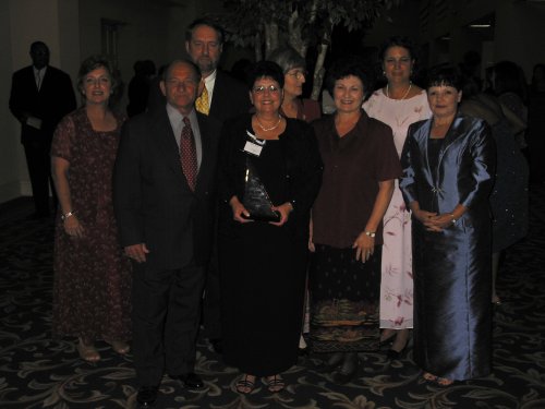 Front row: Donna Carville, Dow Chemical, Ronnie Babin, Babs Babin, Honoree, Sallye Troxclair, Dow Chemical, Alice LeBlanc, Honoree's Sister Back row: Mayor Joey Normand, Councilwoman Joanne Bourgeois, Genie Hendry, West Baton Rouge Historical Association Also attending but not shown, Ron Hendry